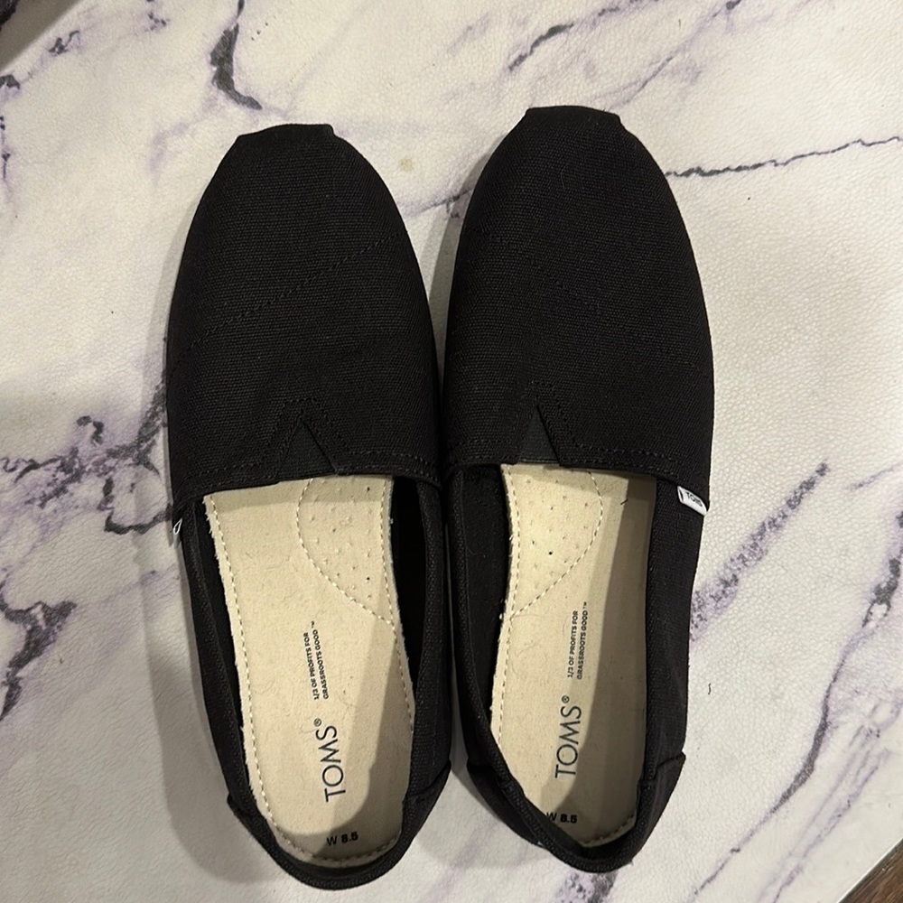 Never worn Black Toms Shoes Size 8.5